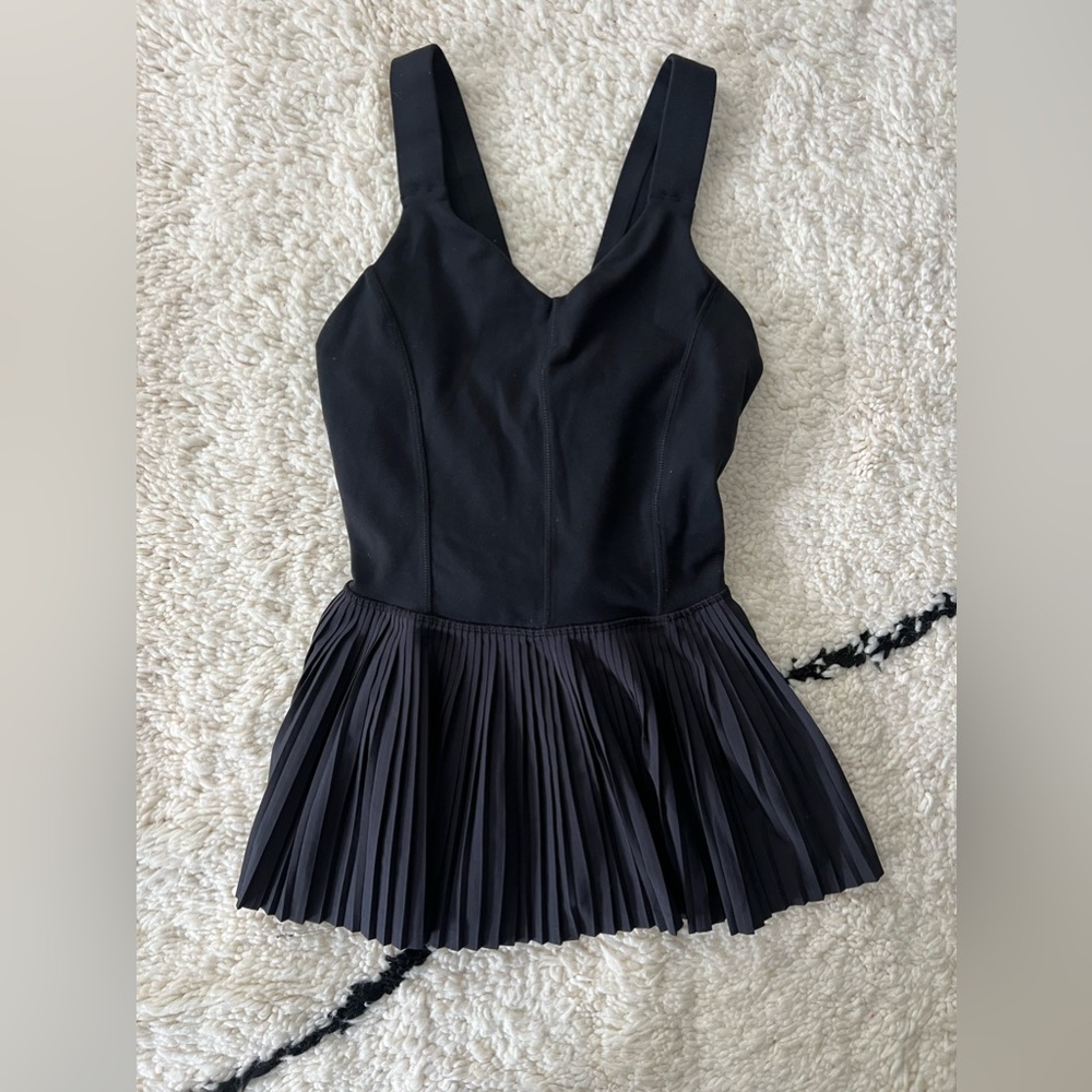 Excellent condition Lululemon black pleated peplum tank